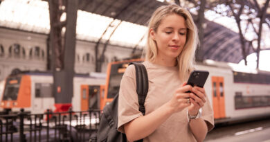 image-attractive-woman-holding-phone-railway-station