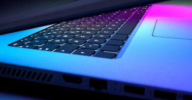 Close Up Keyboard Laptop With Blue Pink Lighting Technology Concept