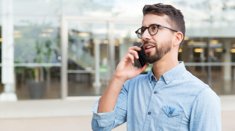 Pensive Guy Eyewear Speaking Cellphone