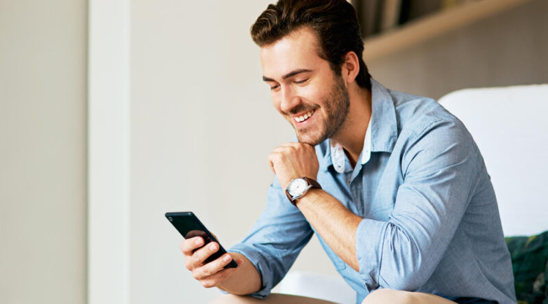 looks-like-theres-lot-buzzing-online-shot-handsome-young-man-texting-cellphone-home (1)