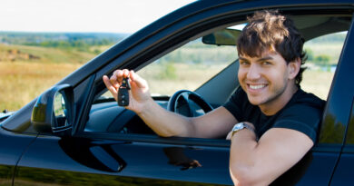 Successful Young Happy Man Showing Keys Sitting New Car