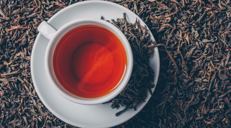 cup-tea-tea-herbs-background-top-view