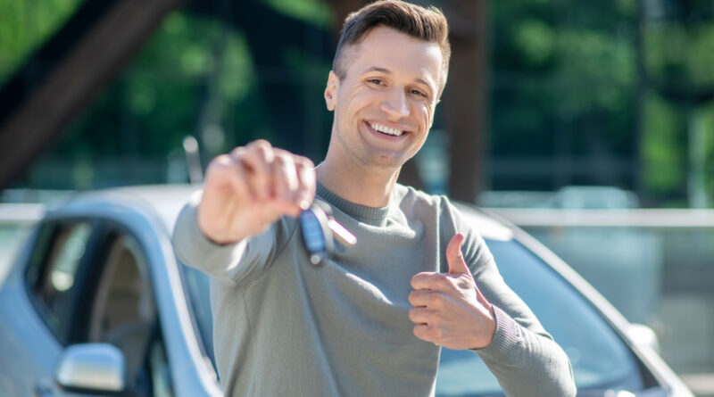 Happy Man With Car Key Street