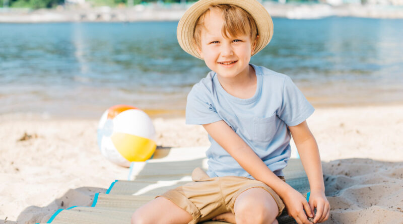 Smiling Boy Sitting Mat Sand Shore