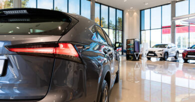 dealership-car-show-premium-cars-foreground-gray-suv