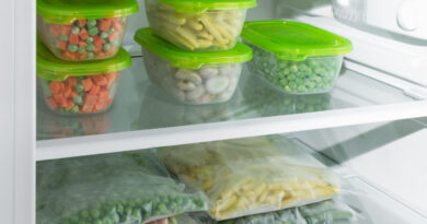 plastic-containers-bags-with-different-frozen-vegetables-refrigerator