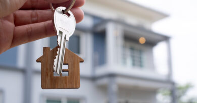 Landlord Unlocks House Key New Home Real Estate Agents Sales Agents