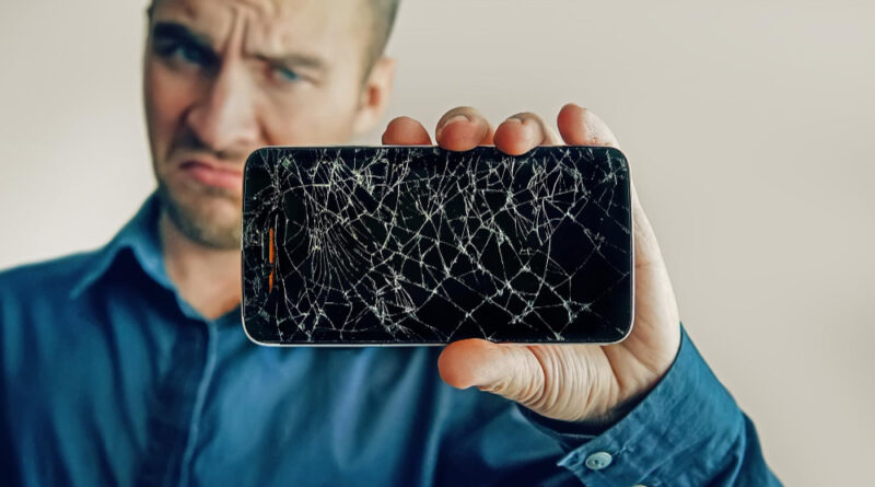 Guy Is Holding Black Smartphone With Broken Display Broken Screen Modern Frameless Phone Large Crack Form Web Smartphone Screen Closeup