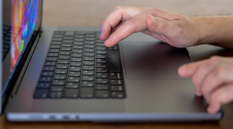 closeup-male-hands-are-typing-keys-laptop