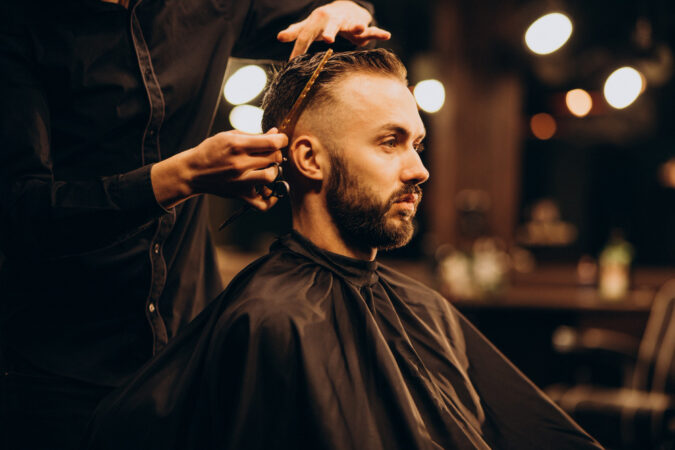 young-man-barbershop-trimming-hair