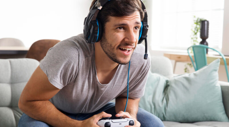 Medium Shot Happy Man Playing Game