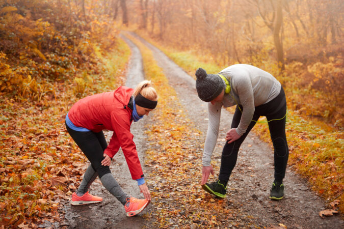 senior-couple-doing-exercises-nature