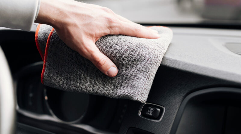 Close Up Person Cleaning Car Interior