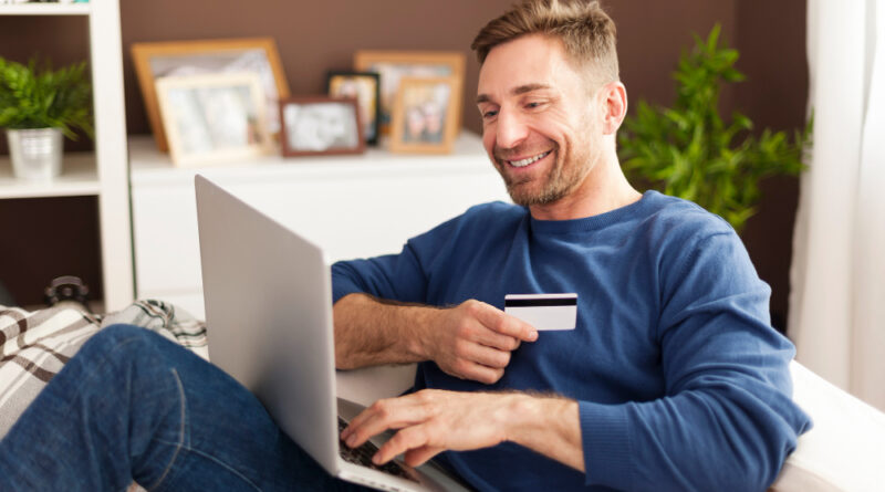 Smiling Man During Online Shopping Home
