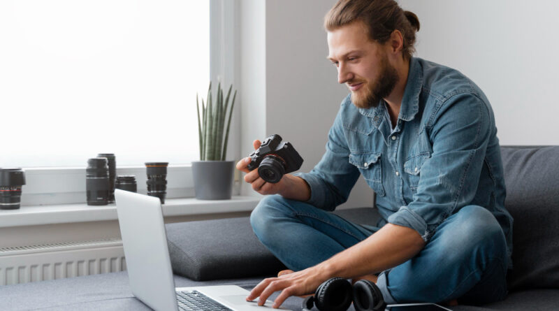 Full Shot Man With Camera Laptop