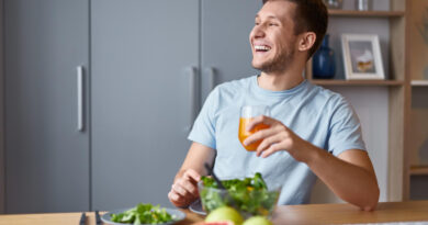 Laughing Man Enjoying Delicious Meal