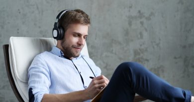 handsome-man-listening-music-headphones
