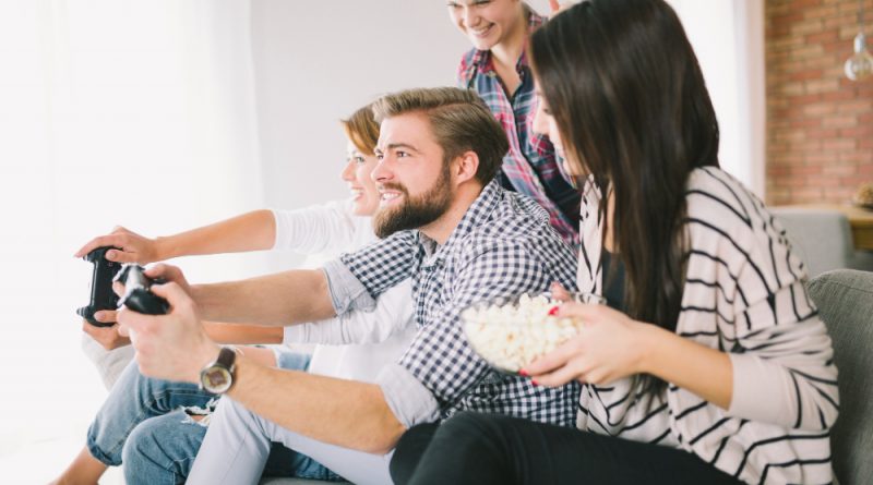 Cheerful People Playing Game Party