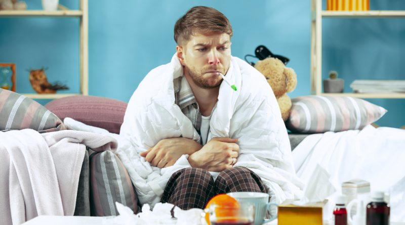 Bearded Sick Man With Flue Sitting Sofa Home Measuring Body Temperature Winter Illness Influenza Pain Concept Relaxation Home Healthcare Concepts