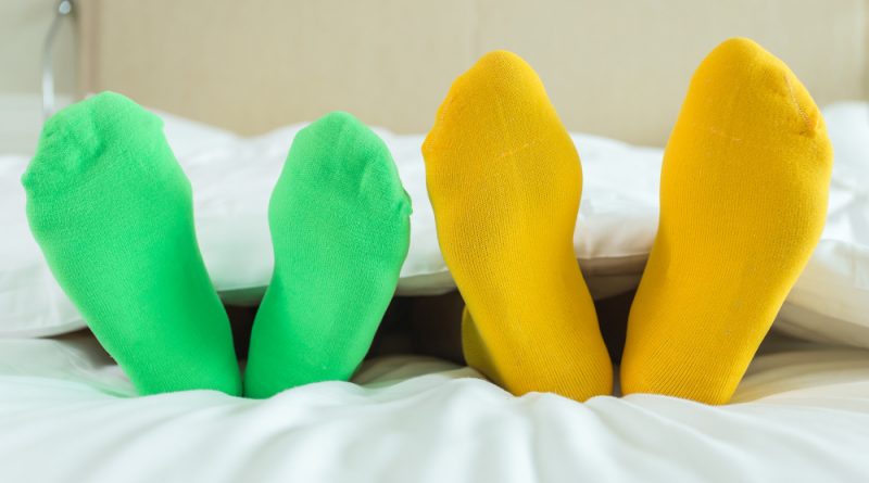 Close Up Foots Family With Color Sock Bed