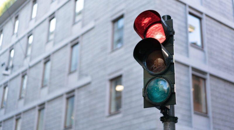 Red Traffic Light Downtown With Clipping Path Copy Space