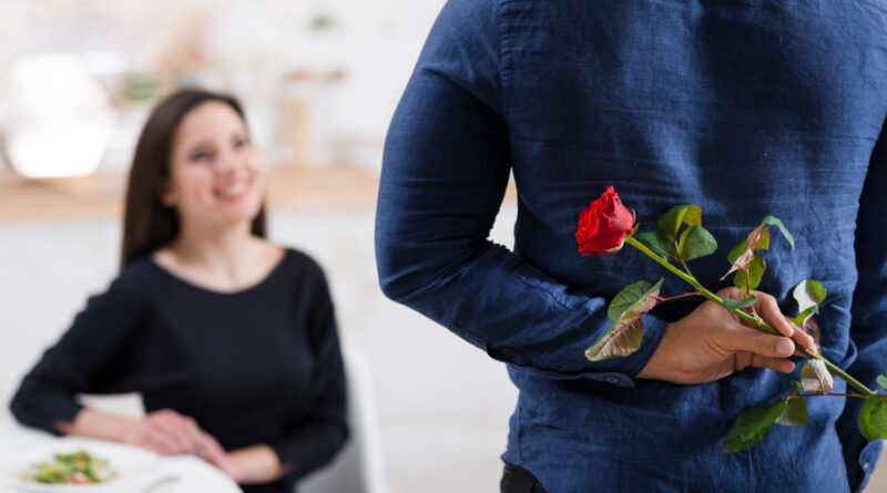 Man Hiding Rose From His Girlfriend