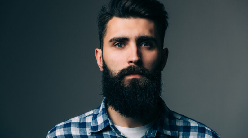 Portrait Masculinity Portrait Handsome Young Bearded Man While Standing Against Grey Wall