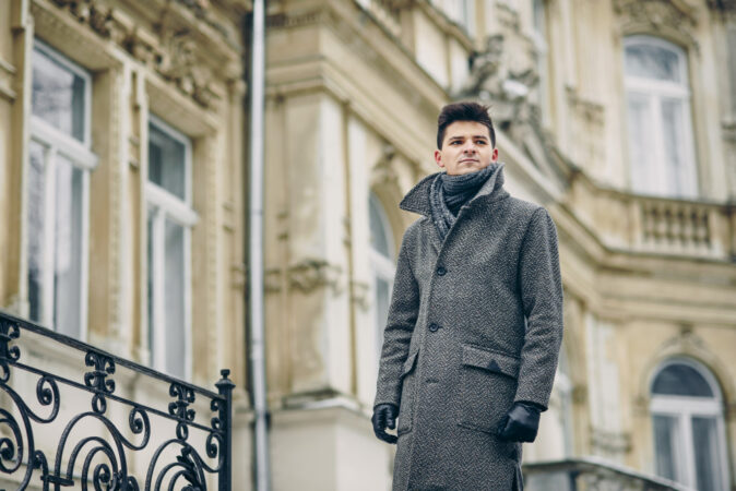 Stylish Young Man Warm Gray Coat Leather Gloves Old Historic Building