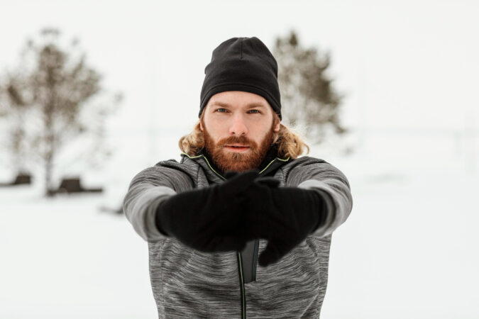 Medium Shot Man Stretching Hands