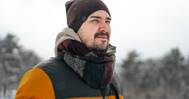 Young Man Warm Coat Standing Snowy Winter Forest