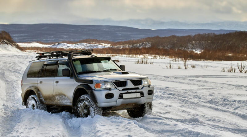 Car Suv Drives Through Snowcovered Mountain Valley With Deep Snow After Snowstorm Jeep Got Stuck Snowdrift Mountains