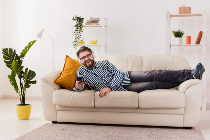 Smiley Man Sofa Enjoying Music