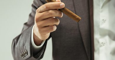 Barded Man Suit Holding Cigar