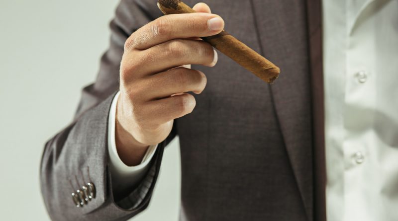 Barded Man Suit Holding Cigar