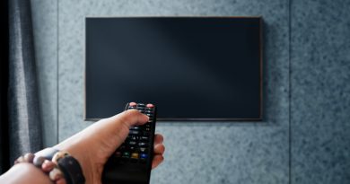 watching-television-concept-hand-holding-tv-s-remote-control-changing-channel