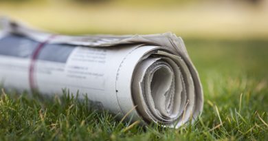 newspaper-green-grass-outdoors-background (1)