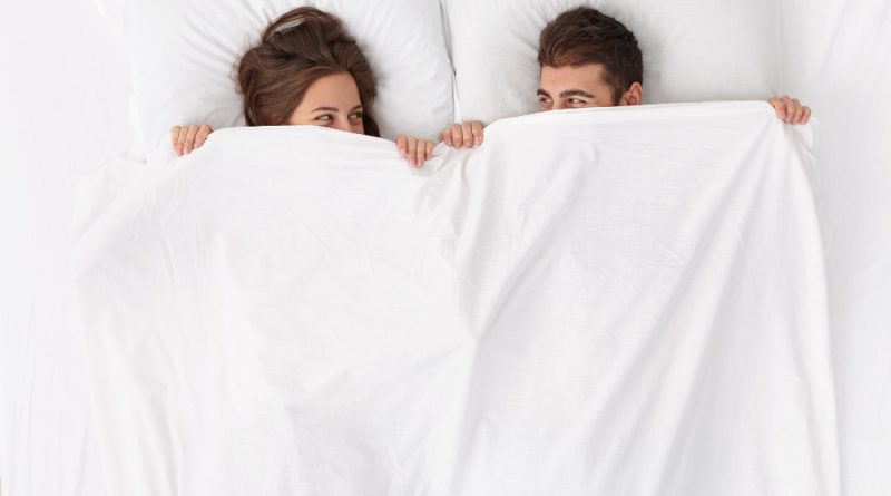 Close Up Couple Lying Bed White Blanket