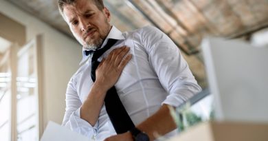 view-distraught-businessman-feeling-chest-pain-after-being-fired-from-work