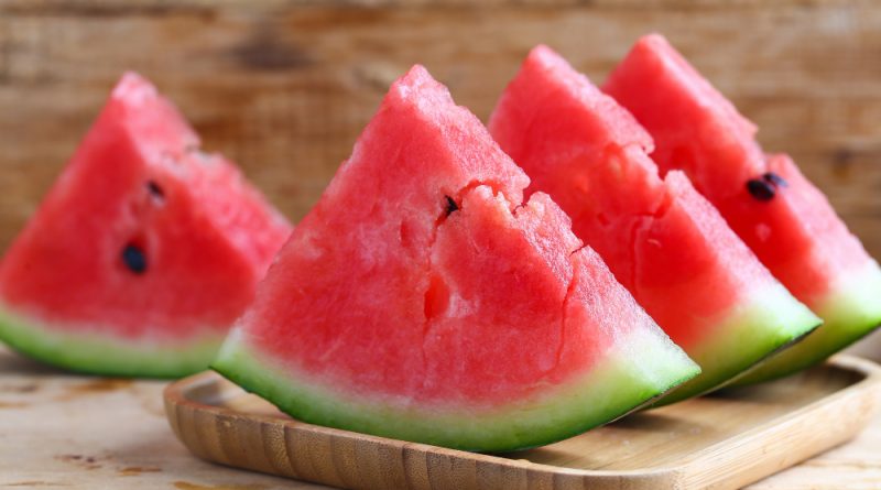 Fresh Sliced Watermelon Wooden Background