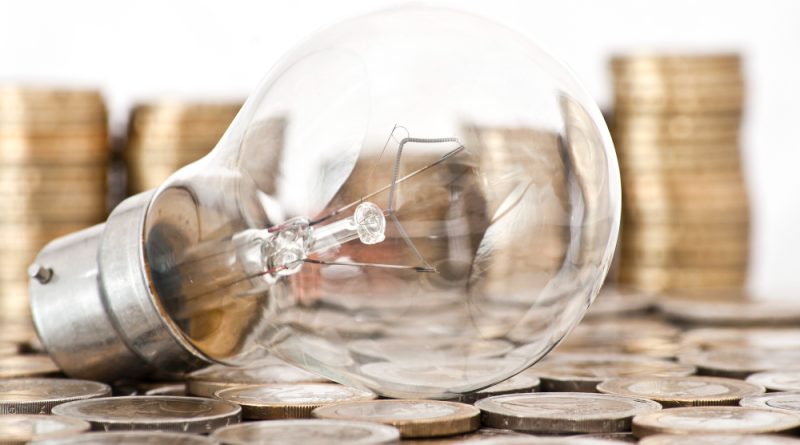 Filament Bulb Lying Euro Coins