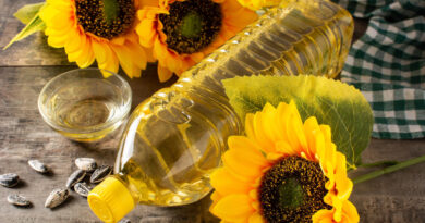 Sunflower Oil Plastic Bottle Wooden Table