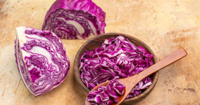 top-view-prepare-bowl-chopped-red-cabbage-beet-salad-wooden-background-with-copy-place-upper-right-corner