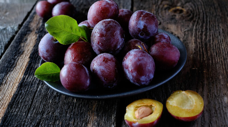 Fresh Violet Plums Dark Wooden Table Background