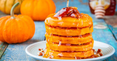 pumpkin-pancakes-with-honey-pecan-wooden-table