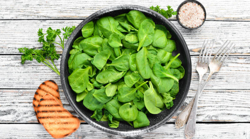 Fresh Spinach Black Plate Wooden Background Top View Free Space Your Text Flat Lay