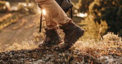 active-male-backpacker-trekking-boots-walking-trail