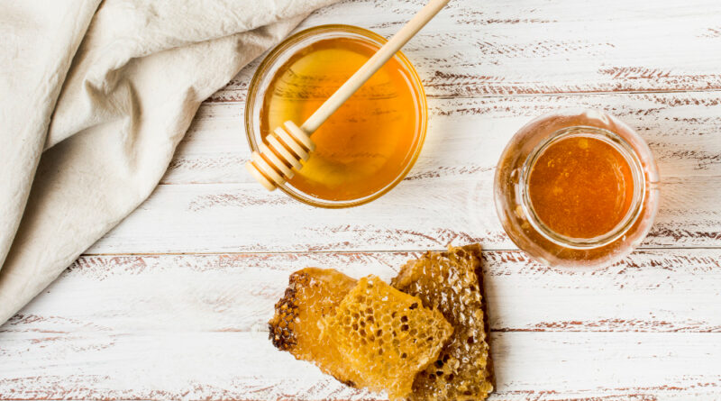 Top View Honey Jars With Honeycomb