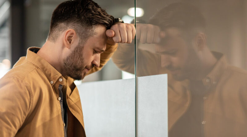 Depressed Businessman Standing Near Door Having Business Problem Office