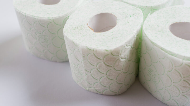 Rolled up toilet paper isolated white background