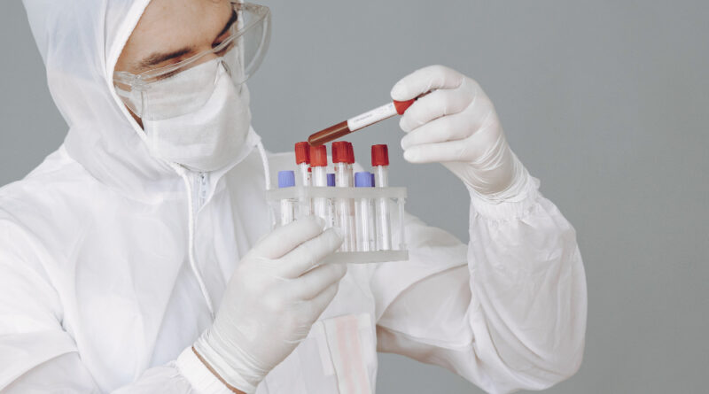 Man protective suit glasses working laboratory